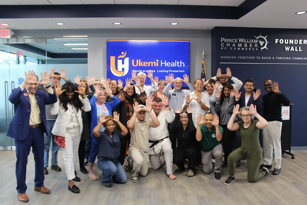 Ukemi Health community members practicing protective hand positions together